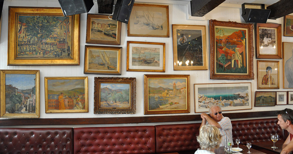 Original paintings on the wall of the Cafe des Templier